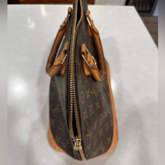 Louis Vuitton Alma PM Handbag - Picture 5 of 11